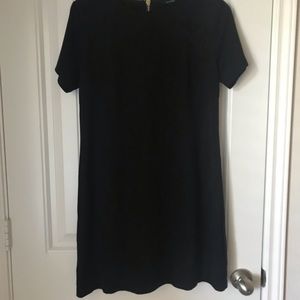 Black short sleeve shift dress with gold zipper!